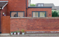 London extension brick wall